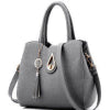 Gray handbag with decorative elements on a white background